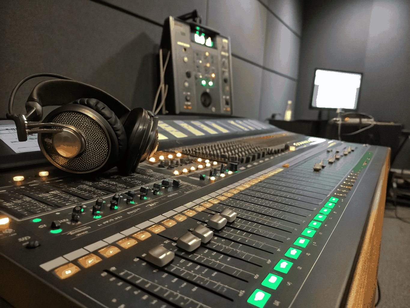 Close up of mixing desk faders