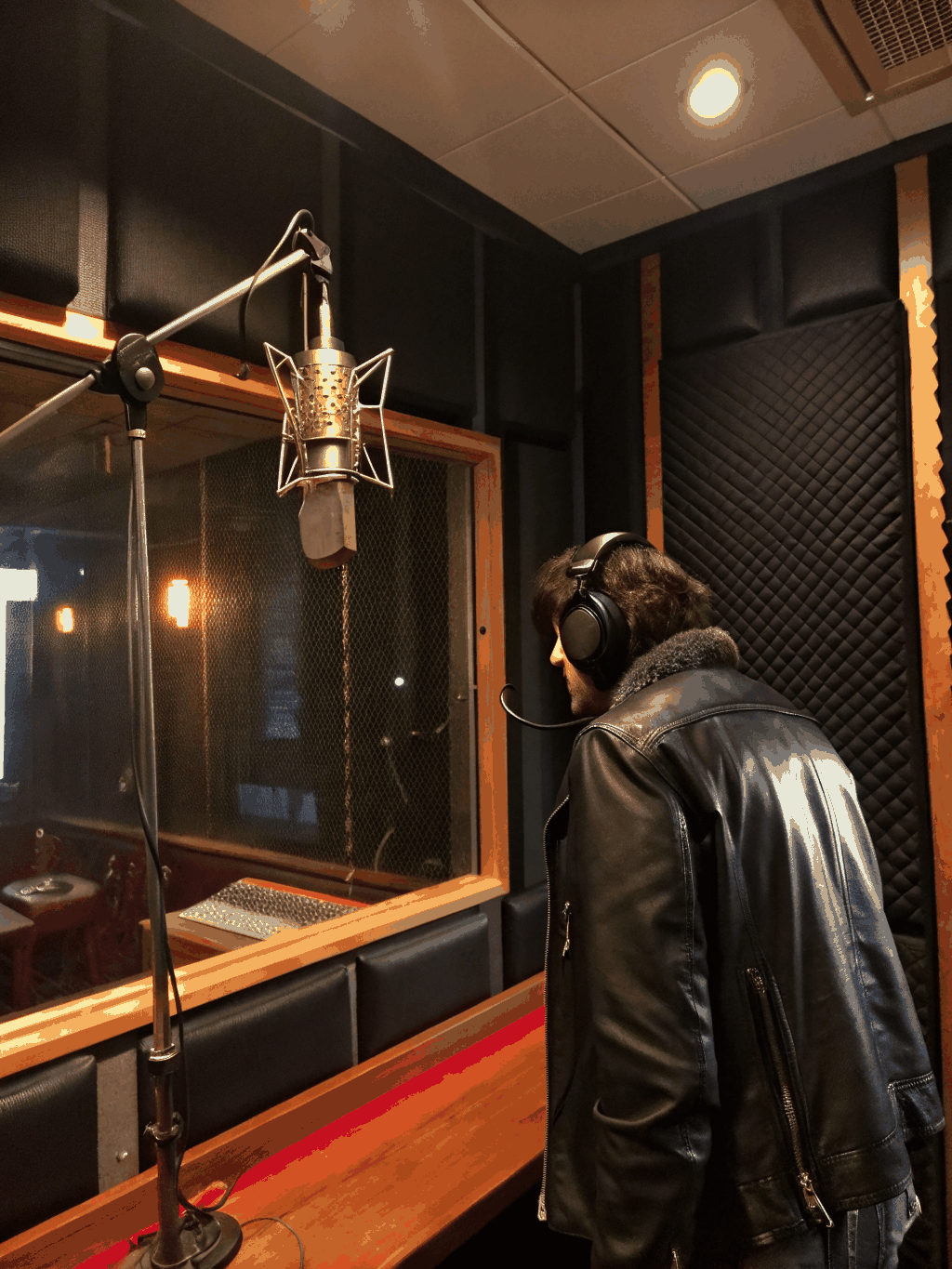 Vocalist tracking live in the booth